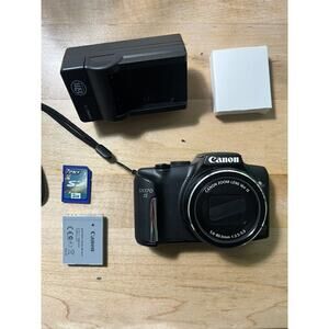 Canon PowerShot SX170 IS 16 MP 16x Zoom Camera Charger 2 Battery Sim WORKS